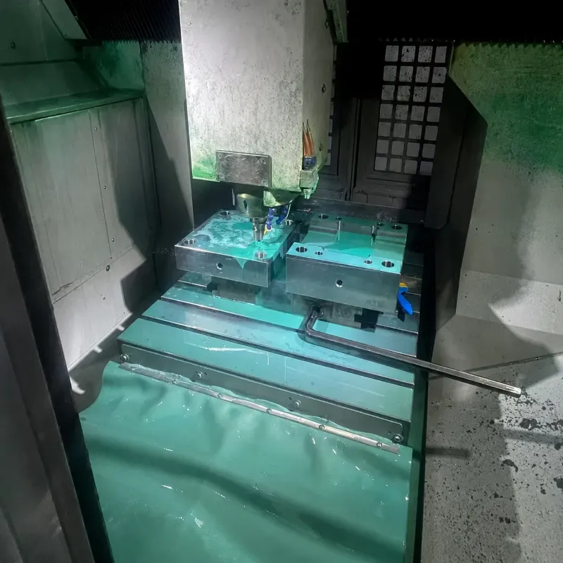 Deflection fixture loading an HDPE crate snap joint at 2 percent strain for 1,000 hours